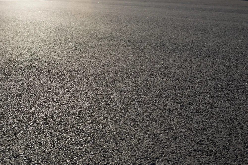 A close up of the ground surface of a street.