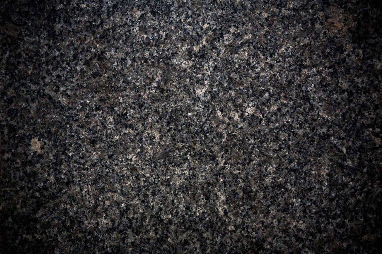 A close up of the granite surface of a counter top